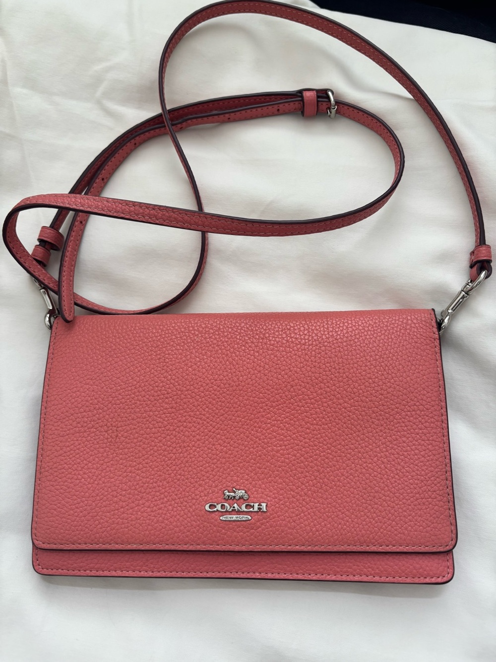 Coach Pebble Leather Fold-Over Clutch in Coral